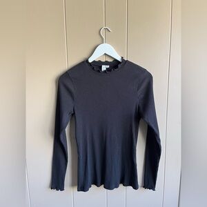Grace & Karma Black Ribbed Form Fitting Medium Long Sleeve With Ruffled Outline
